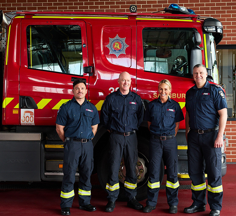 MFS Firefighters group image in corporate uniform.