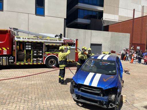 Firefighters performing a car extraction exercise