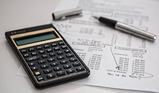 Calculator and invoice.